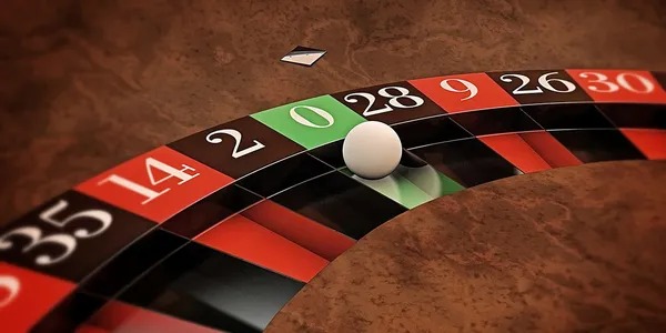 Live dealer placing cards on blackjack table with professional hands and table layout